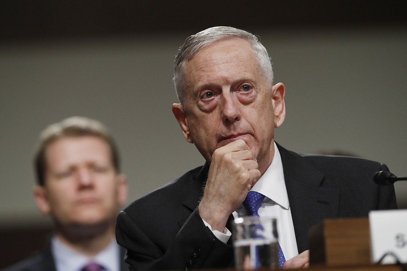 
              FILE - In this June 13, 2017, file photo, Defense Secretary Jim Mattis listens on Capitol Hill in Washington, while testifying before the Senate Armed Services Committee hearing on the Pentagon's budget. As North Korea flaunts its new nuclear muscle, Defense Secretary Jim Mattis is spotlighting the overwhelming numerical superiority of America’s doomsday arsenal. On Wednesday, Sept. 13, he is dropping in on ground zero of American nuclear firepower: Minot Air Force base in North Dakota, home to more than 100 land-based nuclear missiles as well as nuclear bomb-toting aircraft. (AP Photo/Jacquelyn Martin, File)
            