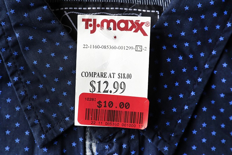 
              This Tuesday, May 16, 2017, photo shows a T.J. Maxx store price tag on a shirt, in Des Moines, Iowa. The cost of clothing, auto insurance and health care rose in August 2017, according to consumer price information released Thursday, Sept. 14, 2017, by the Labor Department. (AP Photo/Charlie Neibergall)
            