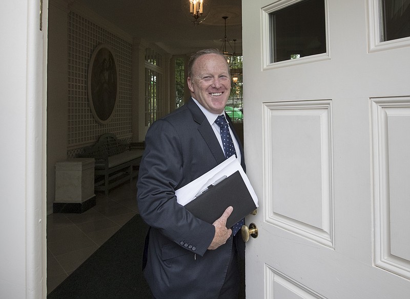 
              FILE - In this Aug. 11, 2017 file photo, former White House press secretary Sean Spicer stands in the doorway to the Palm Room at the White House in Washington, during renovations to the West Wing. It was a different Spicer who paid a visit to ABC’s “Jimmy Kimmel Live” Wednesday night, Sept. 13, 2017. Spicer took Kimmel’s ribbing in much better spirits than the grilling the White House press corps dished out. (AP Photo/J. Scott Applewhite, File)
            