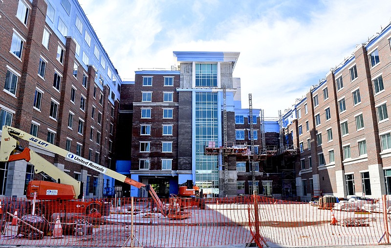 The almost complete West Campus Housing loams over its future courtyard.  University of Tennessee at Chattanooga Chancellor Steve Angle delivered his annual state of the university address on the parking garage of the new West Campus Housing on September 15, 2017.