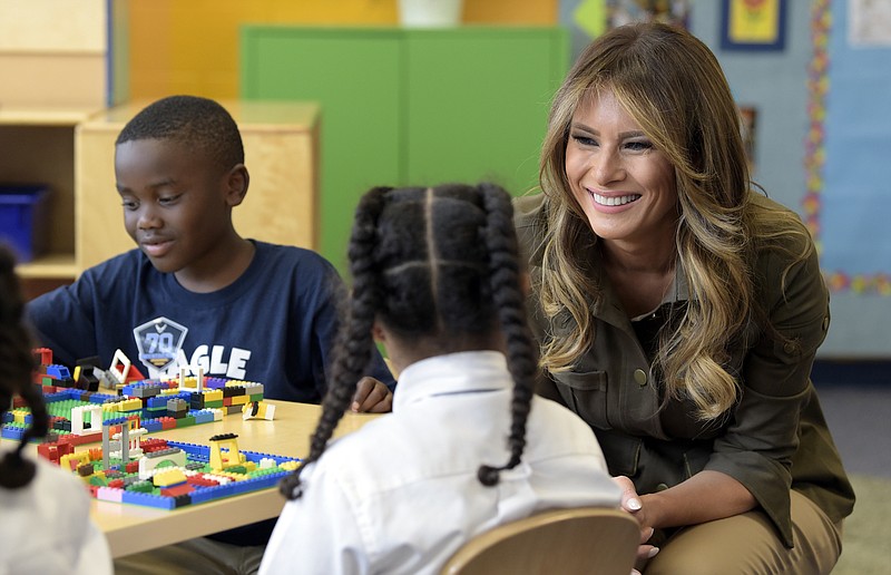 
              First lady Melania Trump visits with children at a youth center at Andrews Air Force Base, Md., Friday, Sept. 15, 2017. (AP Photo/Susan Walsh)
            