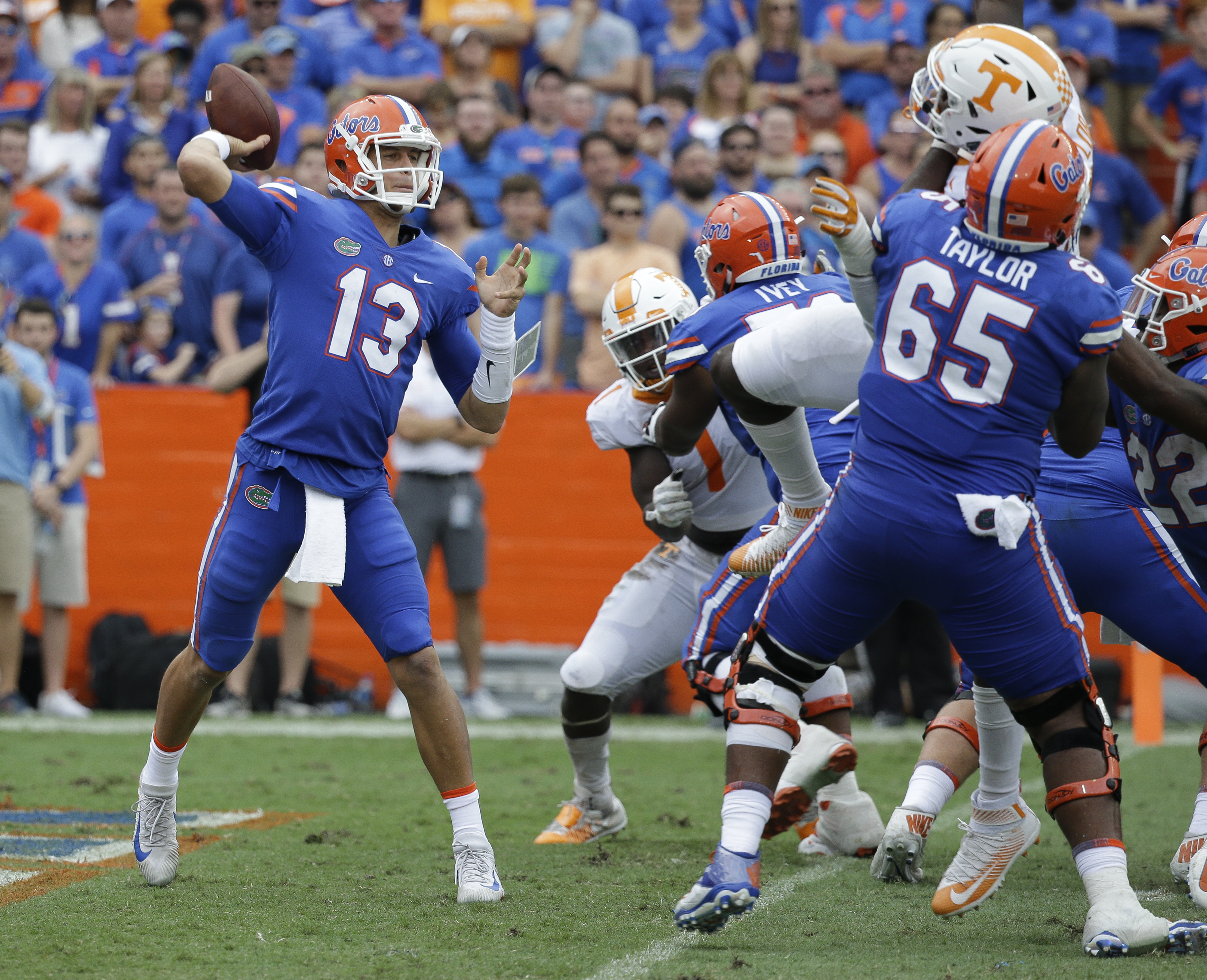 Florida quarterback Feleipe Franks (13) throws a pass as he is pressured by the Tennessee defense during the second half of an NCAA college football game, Saturday, Sept. 16, 2017, in Gainesville, Fla. Florida won 26-20. (AP Photo/John Raoux)