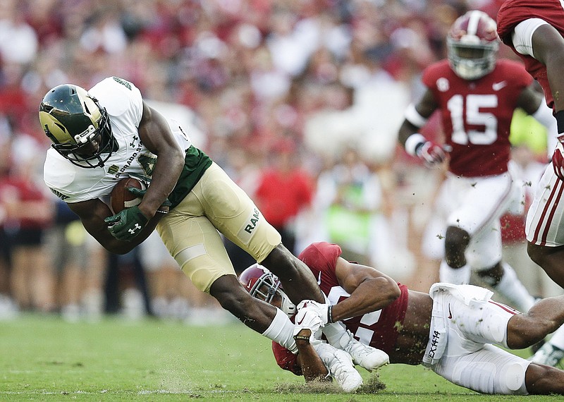 Alabama defensive back Minkah Fitzpatrick makes a shoestring tackle of Colorado State wide receiver Michael Gallup during the first half of Saturday night's game in Tuscaloosa. Crimson Tide defensive players weren't happy with their peformance after giving up 391 yards in Alabama's 41-23 win.