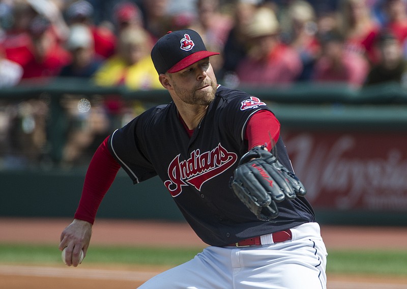 
              Cleveland Indians starting pitcher Corey Kluber delivers to Kansas City Royals' during the first inning of a baseball game in Cleveland, Sunday, Sept. 17, 2017. (AP Photo/Phil Long)
            