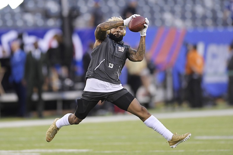 
              New York Giants wide receiver Odell Beckham catches as pass before an NFL football game against the Detroit Lions Monday, Sept. 18, 2017, in East Rutherford, N.J. (AP Photo/Bill Kostroun)
            