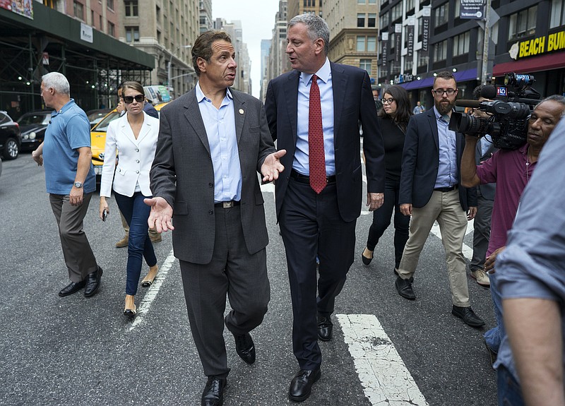 
              FILE - In this Sept. 18, 2016, file photo, New York Gov. Andrew Cuomo, left, and Mayor Bill de Blasio walk on West 23rd street in Manhattan's Chelsea neighborhood in New York. The governor endorsed his frequent rival and fellow Democrat for a second term as mayor of New York City, Monday, Sept. 18, 2017. De Blasio faces Republican state Assemblywoman Nicole Malliotakis of Staten Island in the November election. (AP Photo/Craig Ruttle, File)
            