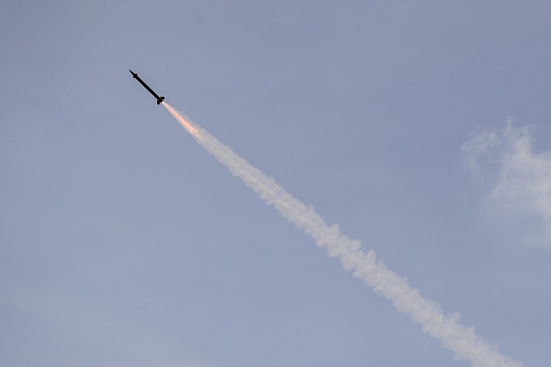 
              An air defense missile flies to hit a mock target during military exercises, near the Volka village, 200 kilometers (125 miles) south-west of Minsk, Belarus, Tuesday, Sept. 19, 2017. The Zapad (West) 2017 military drills held jointly by Russian and Belarusian militaries at several firing ranges in both countries have rattled Russia's neighbors. (AP Photo/Sergei Grits, Pool)
            