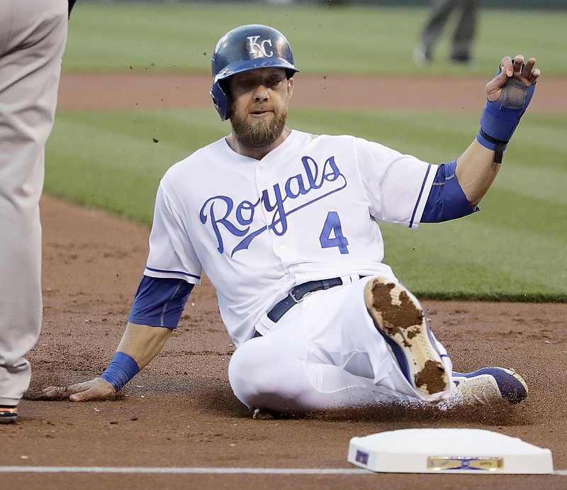 
              FILE - In this Tuesday, April 18, 2017 file photo, Kansas City Royals' Alex Gordon advances to third base on a fly out by Lorenzo Cain during the first inning of a baseball game against the San Francisco Giants in Kansas City, Mo. Kansas City's Alex Gordon hit Major League Baseball's record 5,694th home run of 2017 on Tuesday night, Sept. 19, 2017 breaking a season record set in 2000 at the height of the Steroids Era. (AP Photo/Charlie Riedel, File)
            