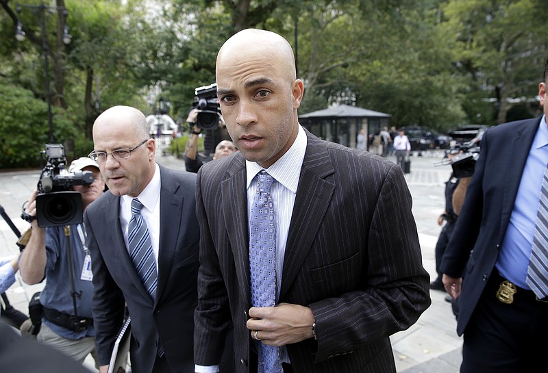
              FILE - In this Sept. 21, 2015, file photo, James Blake arrives at New York's City Hall. A 2015 incident where former pro tennis star Blake was mistakenly arrested in New York City has become the subject of a disciplinary trial for the arresting officer accused of using excessive force. The 37-year-old Blake is expected to testify at a proceeding starting Tuesday, Sept. 19, 2017. (AP Photo/Seth Wenig, File)
            
