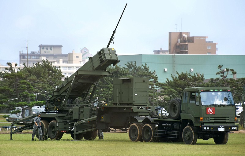 
              Patriot Advanced Capability-3 interceptor missile system (PAC3) is deployed at the Hakodate base of Japan's Self-Defense Forces Tuesday, Sept. 19, 2017 in Hakodate, northern Japan.  Japan is moving a mobile missile-defense system on the northern island of Hokkaido to a base near recent North Korean missile flyover routes. (Kyodo News via AP)
            