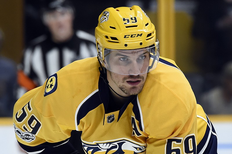 FILE - Nashville Predators defenseman Roman Josi, of Switzerland, plays against the Toronto Maple Leafs during the first period of an NHL hockey game in Nashville, Tenn. The Predators named Josi as the eighth captain in the franchise's history on Tuesday, Sept. 19, 2017. (AP Photo/Mark Zaleski)