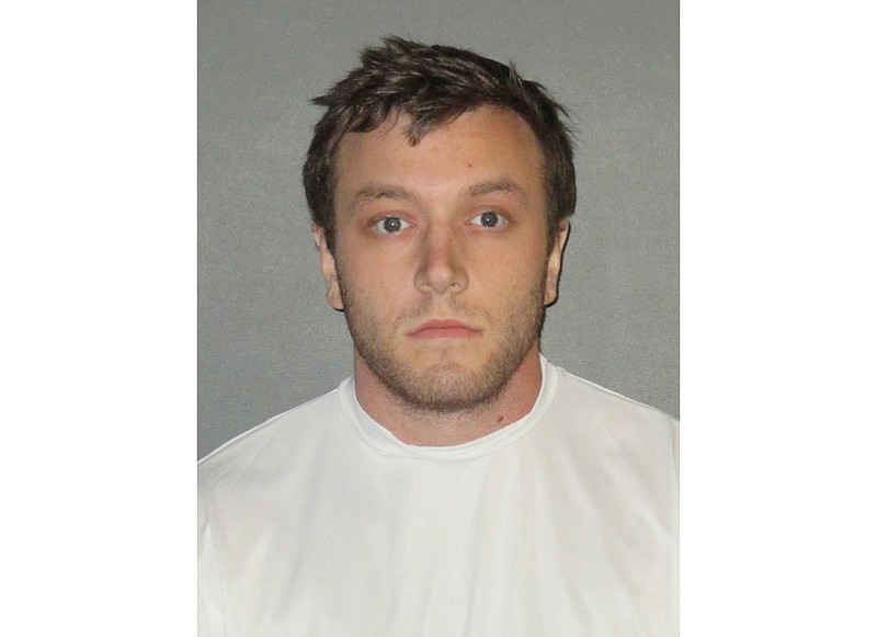 
              Kenneth Gleason is shown in an undated booking photo provided by the East Baton Rouge Sheriff’s Office. Police believe the slayings of two black men in Baton Rouge were likely racially motivated and said Sunday, Sept. 17, 2017, that  they have a person of interest — Gleason— in custody. Gleason, was being held on drug charges. Authorities do not yet have enough evidence to charge him with murder, Baton Rouge Sgt. L'Jean McKneely told The Associated Press. (East Baton Rouge Sheriff’s Office via AP)
            