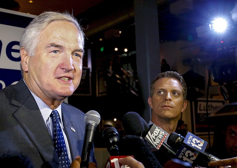 
              FILE- In this Aug. 15, 2017, file photo, Sen. Luther Strange speaks to media after forcing a runoff against former Chief Justice Roy Moore in Homewood, Ala. U.S. Rep. Mo Brooks, who finished third in Alabama’s GOP Senate primary, has announced his support for Roy Moore in the heated runoff with Strange. At a Saturday, Sept. 16, rally in Huntsville, Brooks said he has voted by absentee ballot for Moore.(AP Photo/Butch Dill, File)
            