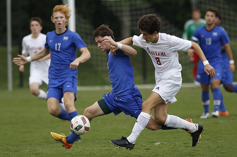 McCallie's Thomas Priest, left, gets out ahead of Baylor's John Musick during a match this spring at Baylor. Priest was an all-state selection last season.