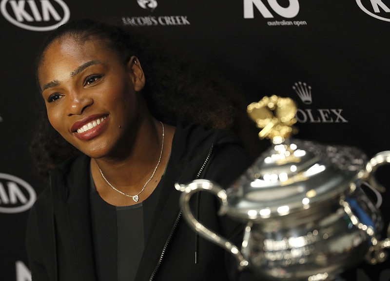 
              FILE - In this Jan. 28, 2017, file photo, Serena Williams answers questions at a press conference after defeating her sister Venus to win the women's singles final at the Australian Open tennis championships in Melbourne, Australia. Williams praised her mother Oracene Price for being a role model in an open letter posted to Reddit on Sept. 19, 2017. (AP Photo/Kin Cheung, File)
            