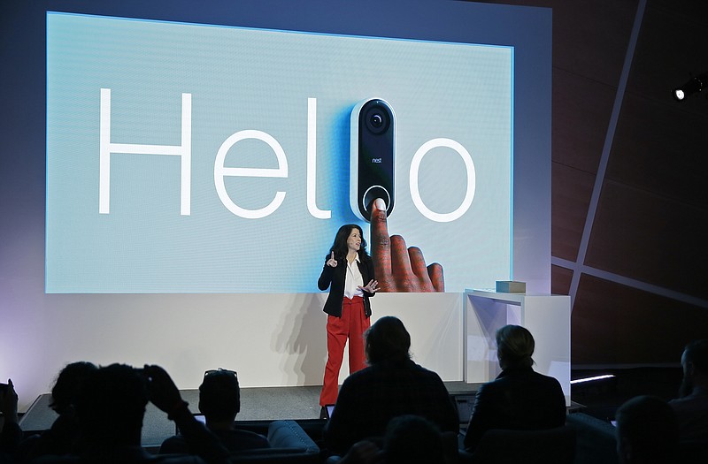 
              Michelle Turner, general manager of security products for Nest Labs, talks about the Hello doorbell during an event Wednesday, Sept. 20, 2017, in San Francisco. Home device maker Nest Labs is adding Google's facial recognition technology to a camera-equipped doorbell and rolling out a security system in an attempt to end its history of losses. The products announced Wednesday expand upon the internet-connected thermostats, smoke detectors and stand-alone security cameras that Nest has been selling since its inception six years ago. (AP Photo/Eric Risberg)
            