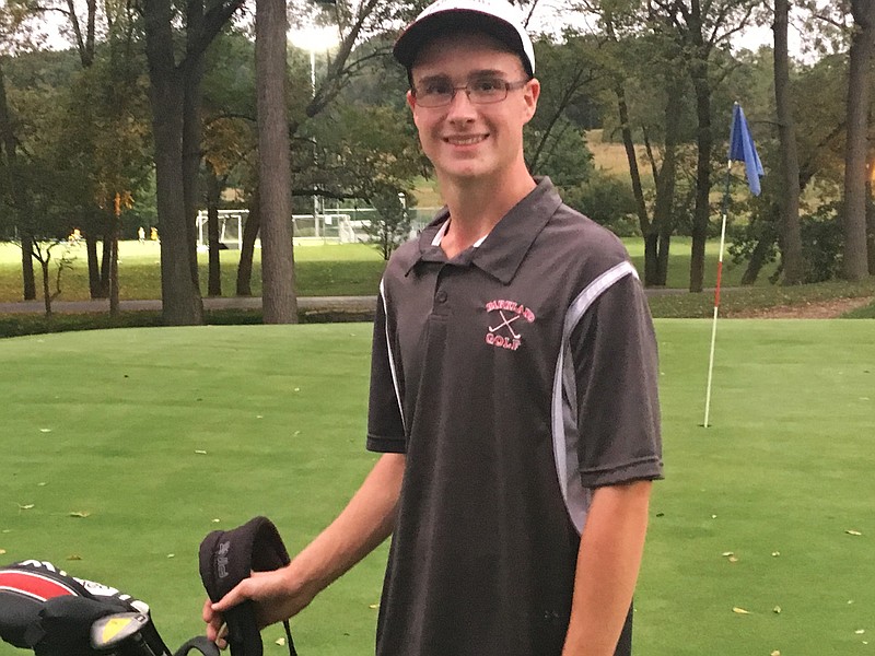 
              In this Tuesday, Sept. 19, 2017 photo, Ben Tetzlaff, a Parkland High senior, poses for a photo at Iron Lakes Country Club in Allentown, Pa. Tetzlaff defied huge odds by recording two holes-in-one in the same round on Monday, Sept. 18. (Mark Wogenrich/The Morning Call via AP)
            