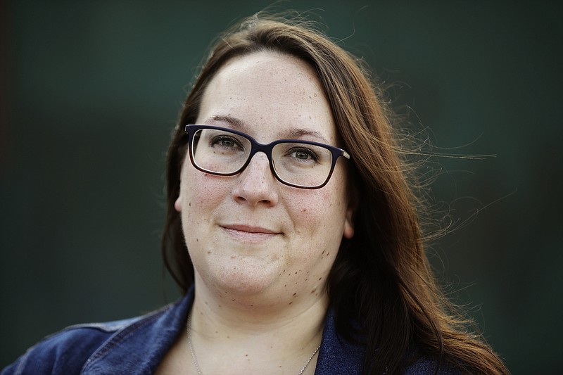 In this Friday, Aug. 25, 2017, photo, Kristen Nielsen Donnelly, director of personnel at Abbey Color Incorporated, poses for a photograph in Philadelphia. The epidemic of drug use in the U.S. is forcing many small business owners to think about what they would do if they suspect an employee is abusing drugs or alcohol. Abbey Color Inc., which seeks to help people who are struggling economically and personally, is located in a neighborhood where drug use has taken a toll. (AP Photo/Matt Rourke)