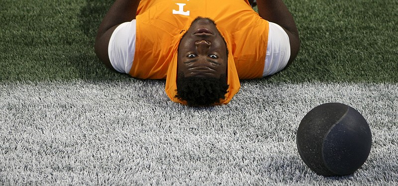 Tennessee right guard Trey Smith stretches before the season opener against Georgia Tech at Atlanta's Mercedes-Benz Stadium. Coaches determined the freshman had the best performance among Vols offensive linemen in the 42-41 win.