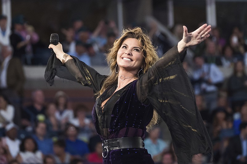 
              FILE - This Aug. 28, 2017 file photo shows Shania Twain performing at the opening night ceremony of the 2017 U.S. Open Tennis Championships in New York. When the queen of country pop contracted Lyme’s disease, she thought her singing career was over. Twain says the process of finding her voice again was gruesome and trying. She trained with coaches and worked extensively on her vocals, comparing the experience to an athlete recovering from a major injury. The result is “Now,” her first album in 17 years to be released Sept. 29. (Photo by Charles Sykes/Invision/AP, File)
            