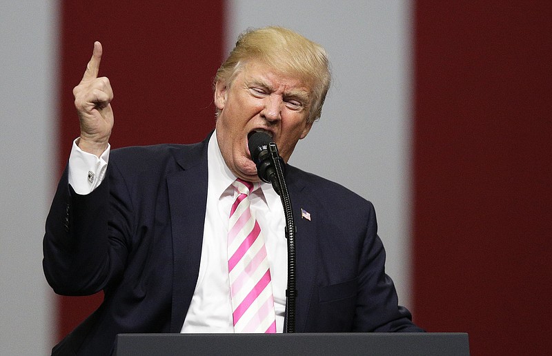 
              President Donald Trump speaks at a campaign rally in support of Sen. Luther Strange, Friday, Sept. 22, 2017, in Huntsville, Ala. (AP Photo/Brynn Anderson)
            