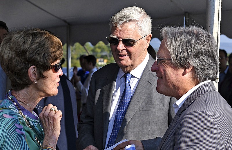 From left, Emeline Haney, Franklin Haney and Tom Decosimo talk before the event.  The Electric Power Board of Chattanooga unveiled its new 100 kilowatt, 4-hour, vanadium redox flow battery made by UniEnergy Technologies of Mukilteo, Washington on September 22, 2017.