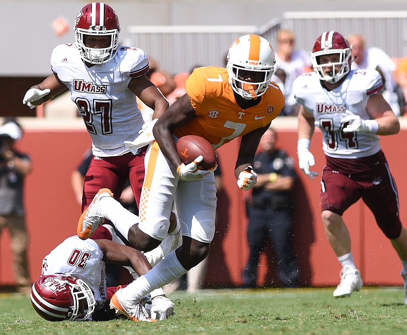 Tennessee's Brandon Johnson (7) breaks lose for a long run after a reception.  The play set up Tennessee's first touchdown.  The University of Massachusetts Minutemen visited the University of Tennessee Volunteers in NCAA football action in Knoxville on September 23, 2017.