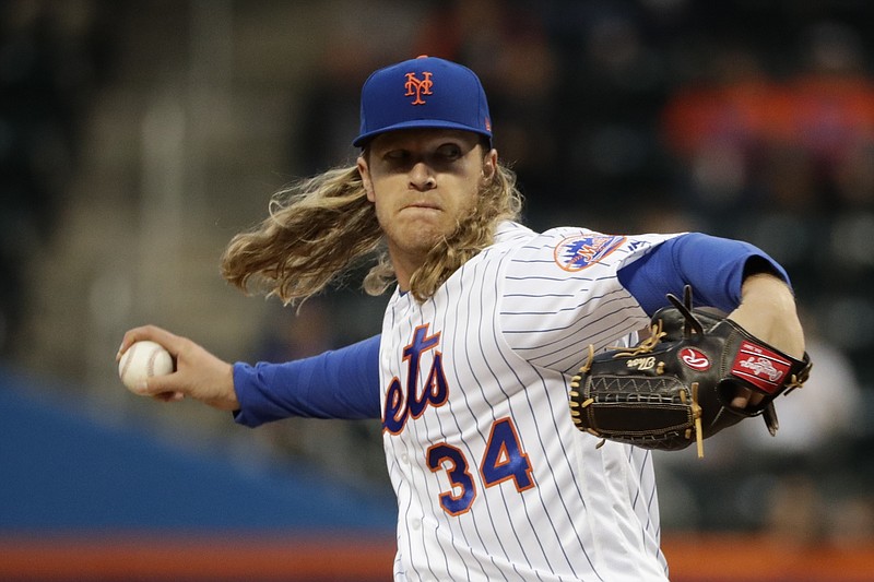 
              FILE - In this Thursday, April 20, 2017 file photo, New York Mets' Noah Syndergaard delivers a pitch during the first inning of a baseball game against the Philadelphia Phillies in New York. The Mets plan to have ace Noah Syndergaard make a one-inning start Saturday, Sept. 23, 2017 in his first major league game in nearly five months. (AP Photo/Frank Franklin II, File)
            