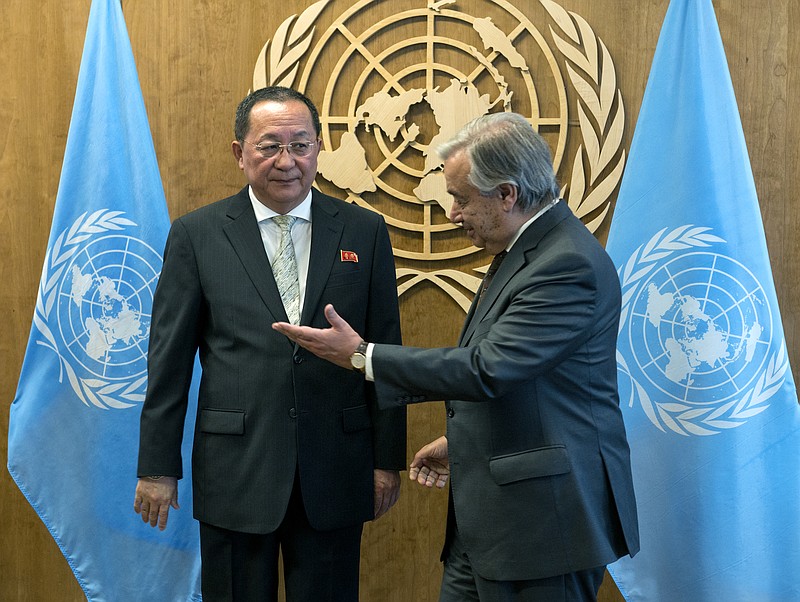 
              North Korean Foreign Minister Ri Yong Ho, left, is greeted by United Nations Secretary-General Antonio Guterres before a meeting, Saturday, Sept. 23, 2017, at U.N. headquarters. (AP Photo/Craig Ruttle)
            