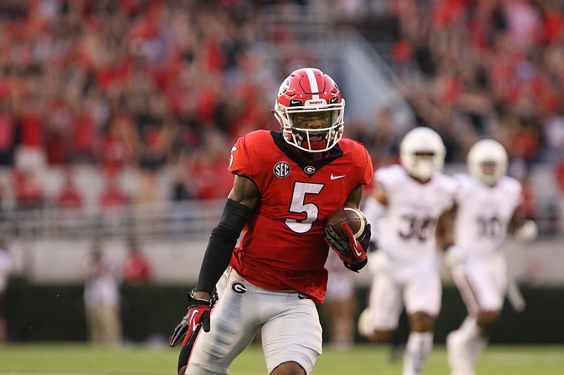 Junior receiver Terry Godwin hauled in a 59-yard touchdown pass from Jake Fromm on Georgia's first play from scrimmage during Saturday night's 31-3 trampling of Mississippi State.