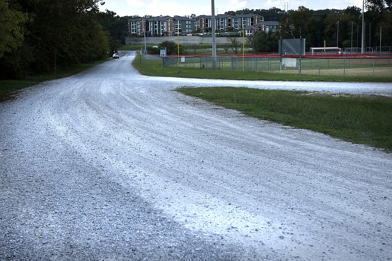 A gravel parking lot is seen in East Hamilton County Park on Friday, Sept. 22, 2017, in Collegedale, Tenn. The busy park is in need of a paved parking lot, according to Collegedale Mayor Katie Lamb, and several of the playing fields need lights.