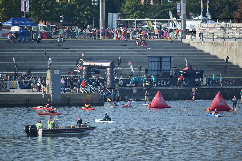 The last of the swimmers arrive at Ross's Landing on the Tennessee River Sunday morning in Chattanooga during the first leg of the 2017 Little Debbie Ironman event.