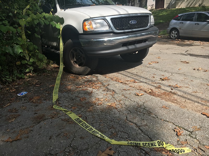 Crime scene tape is seen left in front of 411 Central Drive on Sunday, Sept. 24, 2017.