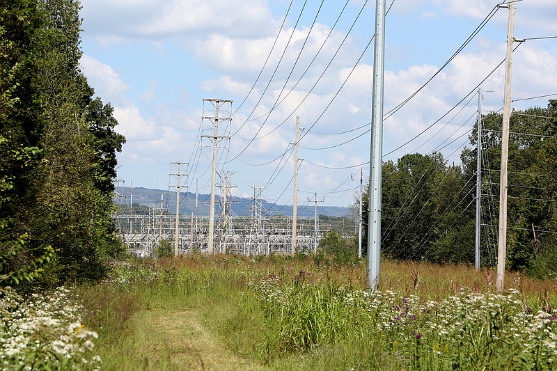 A portion of the Browns Ferry Federal Road Trail runs under power lines in Chattanooga, Tenn., Tuesday, Sept. 26, 2017. A general management plan thatճ been in the works for decades to overhaul the Moccasin Bend National Archeological District received final approval earlier this month. 