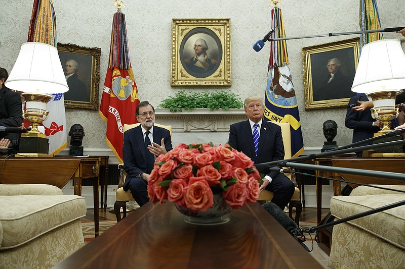 
              President Donald Trump meets with Spanish Prime Minister Mariano Rajoy in the Oval Office of the White House, Tuesday, Sept. 26, 2017, in Washington. (AP Photo/Evan Vucci)
            