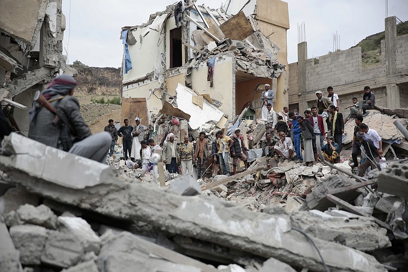 
              FILE - In this Aug. 25, 2017 file photo, People inspect the rubble of houses destroyed by Saudi-led airstrikes in Sanaa, Yemen. The Monday, Sept. 25, 2017, Kurdish independence referendum in Iraq is the latest in a series of moves toward formal secession or de facto fragmentation caused by conflict, race or religion in the Middle East. It’s a trend viewed with considerable alarm in a region that had seriously flirted with merging its nations in post-colonial years more than a half century ago. (AP Photo/Hani Mohammed, File)
            