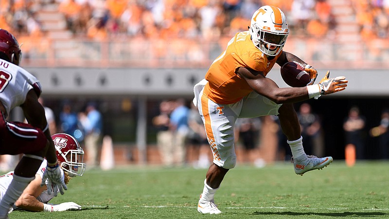 Tennessee running back John Kelly heads to the end zone for the Vols' first touchdown in this past Saturday's home win against UMass.