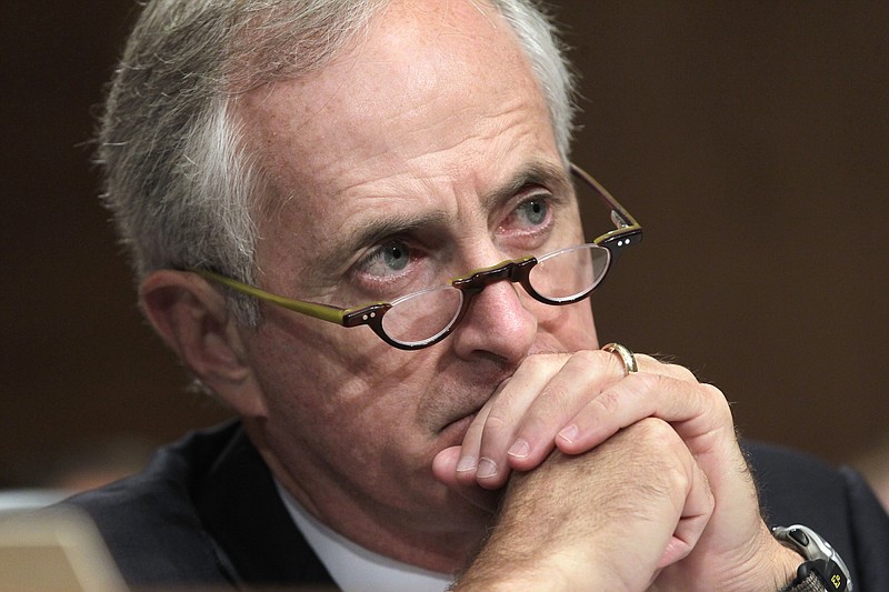 
              FILE - This Oct. 6, 2011 file photo shows Senate Banking Committee member Sen. Bob Corker, R-Tenn., listening during a hearing on Capitol Hill in Washington. In a surprise announcement, the two-term lawmaker said Tuesday, Sept. 26, 2017, the he will not seek re-election in 2018. (AP Photo/J. Scott Applewhite, File)
            