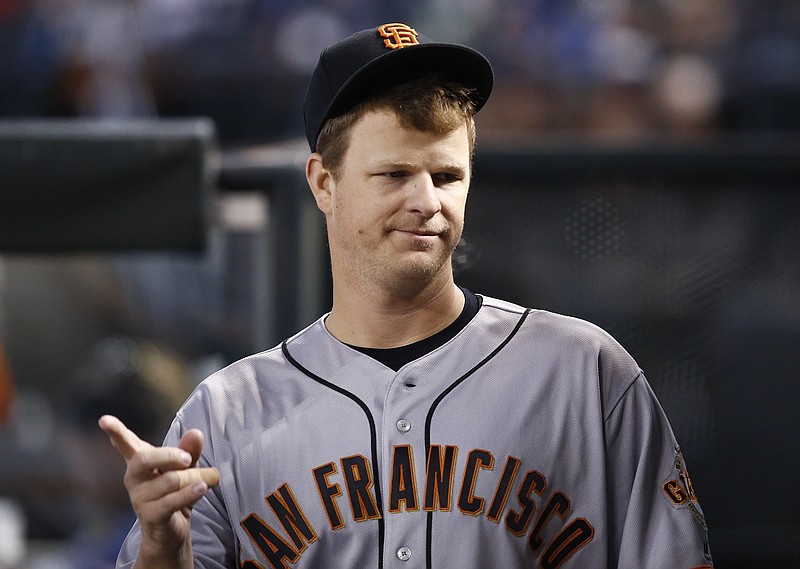 San Francisco Giants pitcher Matt Cain, right, joined by his wife