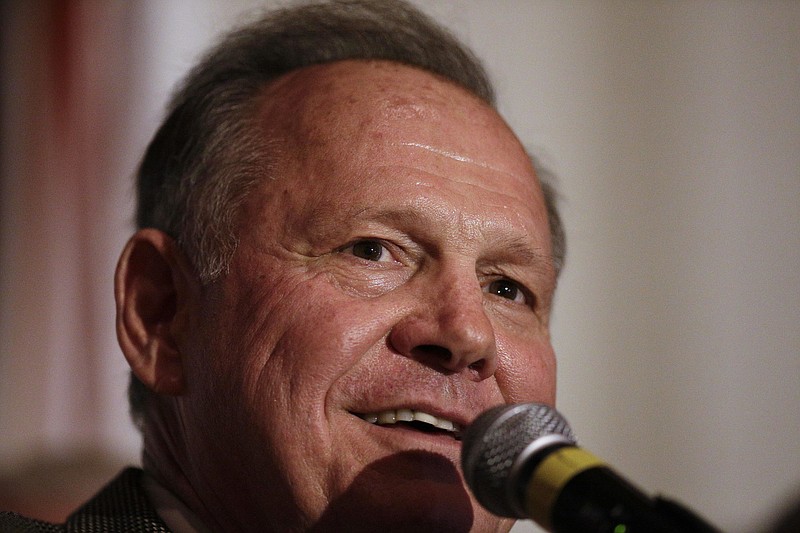 
              Former Alabama Chief Justice and U.S. Senate candidate Roy Moore speaks during his election party, Tuesday, Sept. 26, 2017, in Montgomery, Ala. Moore won the Alabama Republican primary runoff for U.S. Senate on Tuesday, defeating an appointed incumbent backed by President Donald Trump. (AP Photo/Brynn Anderson)
            