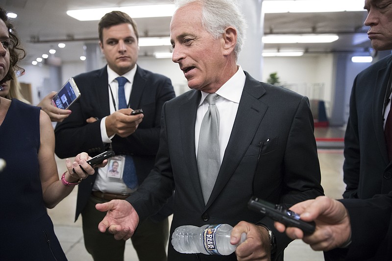 Sen. Bob Corker, R-Tenn., chairman of the Senate Foreign Relations Committee, chats with reporters at the Capitol in Washington, Tuesday, Sept. 26, 2017. Corker, a two-term senator, announced today that he will not run for re-election in 2018. (AP Photo/J. Scott Applewhite)