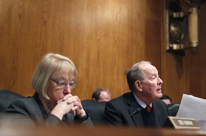 
              FILE- In this Jan. 31, 2017, file photo, Senate Health, Education, Labor, and Pensions Committee Chairman Sen. Lamar Alexander, R-Tenn., accompanied by the committee's ranking member Sen. Patty Murray, D-Wash. speaks on Capitol Hill in Washington during the committee's executive session to discuss the nomination of Education Secretary Betsy DeVos. Congress is at a crossroads after Senate GOP leaders announced on Tuesday, Sept. 26, that they would not take their latest repeal of Barack Obama’s health care law bill to the floor for lack of support. Alexander said he would resume efforts to reach a bipartisan deal with Murray to stabilize markets for individual insurance policies that 18 million people rely on. (AP Photo/Alex Brandon, File)
            