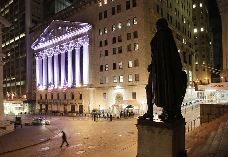 
              FILE - In this Wednesday, Oct. 8, 2014, file photo, a statue of George Washington stands near the New York Stock Exchange, in background. U.S. stocks are lower early Thursday, Sept. 28, 2017, as technology companies decline and smaller companies slip after a rally brought them to record highs. Drug and medical device maker Abbott Laboratories is climbing after regulators approved its new blood glucose monitoring system for diabetes patients. Energy companies are higher as the price of oil rises. (AP Photo/Mark Lennihan, File)
            