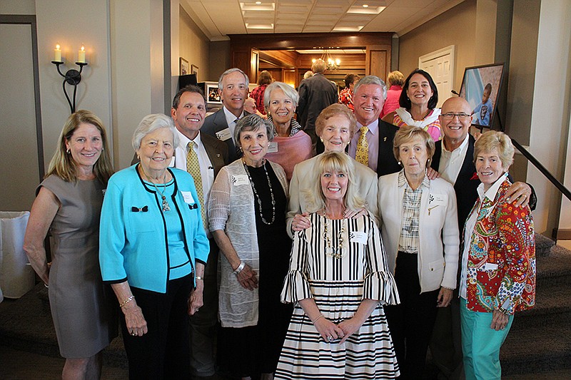 Attending the reception were, Susan Stein, in front; Mary Aho, Carolyn Ballard, Betty Whaley, Carolyn Guerry, Sue Ingham and Betsy Caldwell, second row, from left. In back are Phillip Harris, Mike St. Charles, Marie Thatcher, Phil Acord, Catharine Daniels and Paul Jacobs Jr.