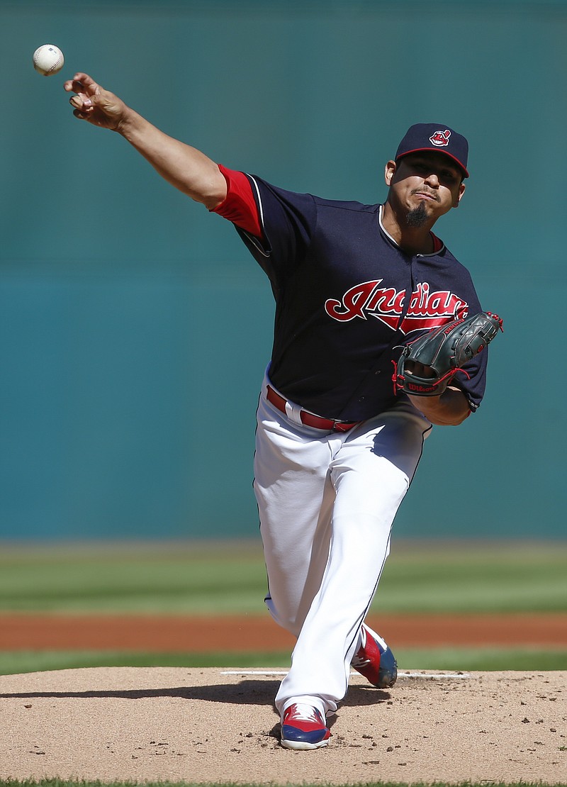 
              Cleveland Indians starting pitcher Carlos Carrasco delivers against the Minnesota Twins during the first inning in a baseball game, Thursday, Sept. 28, 2017, in Cleveland. (AP Photo/Ron Schwane)
            