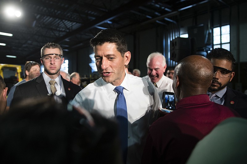
              Speaker of the House Paul Ryan, R-Wis., meets with workers at the Pennsylvania Machine Works, a family-owned pipe-fitting manufacturer, in Aston, Pa., Thursday, Sept. 28, 2017. (AP Photo/Matt Rourke)
            