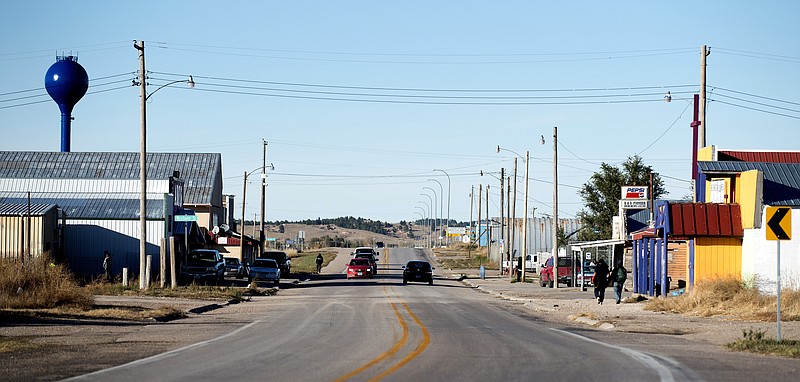 
              FILE- This Oct. 20, 2016 photo shows a view of Whiteclay, Neb. from the south looking north, on Route 87 in Whiteclay, Neb. The Nebraska Supreme Court on Friday, Sept. 29, 2017, rejected a last-ditch effort to resume beer sales in the tiny village next to an American Indian reservation in South Dakota that is plagued by alcohol problems. The court's ruling upholds an April decision by state regulators not to renew the licenses of four beer stores in Whiteclay, Nebraska. (Francis Gardler /The Journal-Star via AP, File)
            