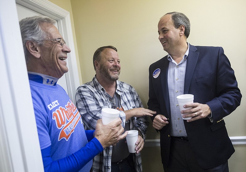 Republican Walker County commissioner candidate Shannon Whitfield, right, talks with David Roden, center, and Stanley Whitfield at an election return party at the Bank of Lafayette's community room on Tuesday, Nov. 8, 2016, in Lafayette, Ga.