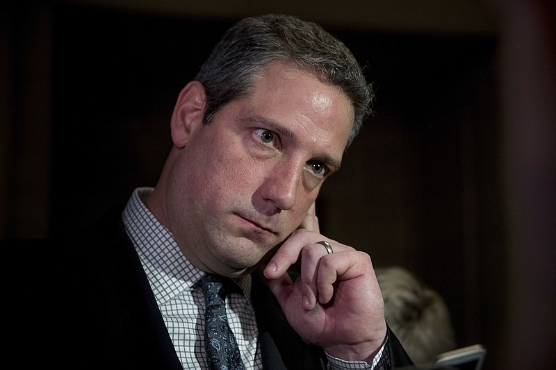 
              FILE - In this Nov. 30, 2016 file photo,  Rep. Tim Ryan, D-Ohio, pauses while speaking to members of the media following the House Democratic Caucus elections on Capitol Hill in Washington. Ryan is among three rising House Democrats, including Illinois' Cheri Bustos and Seth Moulton of Massachusetts, in Des Moines, Saturday, Sept. 30, 2017,  for a Democratic fundraiser, capping a summer of early activity in the presidential proving ground by more than 10 would-be White House prospects.(AP Photo/Andrew Harnik, File)
            