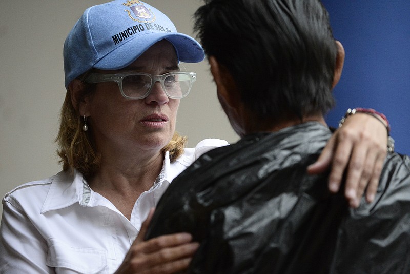 
              San Juan Mayor Carmen Yulin Cruz arrives at the San Francisco hospital during the evacuation of patients after an electrical plant failure, in San Juan, Puerto Rico, Saturday, Sept. 30, 2017. President Donald Trump is lashing out at the mayor of Puerto Rico's capital city in a war of words over recovery efforts after Hurricane Maria smashed into the U.S. territory.
Trump is out with a series of tweets criticizing Cruz for criticizing the Trump administration's hurricane response. (AP Photo/Carlos Giusti)
            